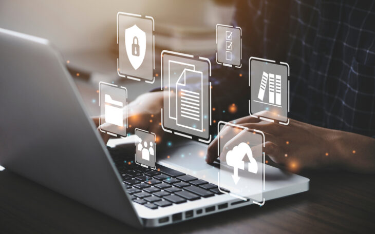 Businessman,Using,A,Computer,To,Document,Management,Concept,,Online,Documentation Businessman,Using,A,Computer,To,Document,Management,Concept,,Online,Documentation